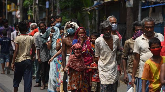 People in a queue to collect free meals during a distribution at College street in Kolkata, West Bengal. (Samir Jana/HT File Photo) People in a queue to collect free meals during a distribution at College street in Kolkata, West Bengal. (Samir Jana/HT File Photo)