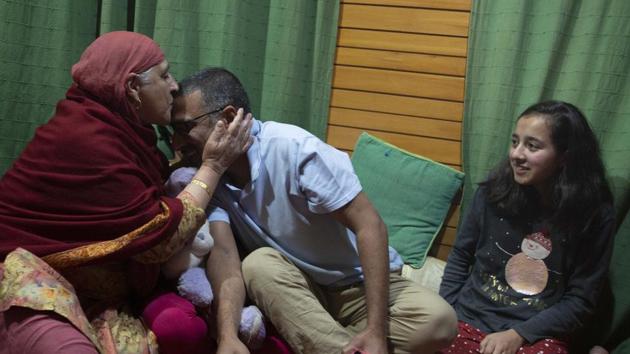 Photojournalist Dar Yasin celebrates with his family at his home in Srinagar, after winning the Pulitzer Prize in Feature Photography category, on Tuesday. (AP Photo) Photojournalist Dar Yasin celebrates with his family at his home in Srinagar, after winning the Pulitzer Prize in Feature Photography category, on Tuesday. (AP Photo)