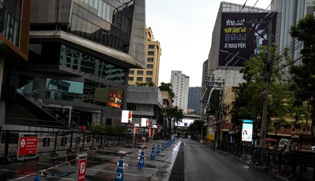 A combination picture shows people playing with water during Songkran Water Festival celebrations, to commemorate the Thai New Year in Bangkok April 13, 2019, and a view of the same street during the outbreak of the coronavirus disease (COVID-19), in Bangkok, Thailand April 13, 2020. (REUTERS)