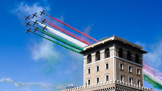 The Italian Air Force aerobatic unit Frecce Tricolori (Tricolor Arrows) perform on April 25, 2020 over Piazza Venezia in Rome, on the 75th anniversary of Liberation Day, which marks the fall of Nazi occupation in 1945, during the country's lockdown aimed at curbing the spread of the COVID-19 infection, caused by the novel coronavirus. (AFP) The Italian Air Force aerobatic unit Frecce Tricolori (Tricolor Arrows) perform on April 25, 2020 over Piazza Venezia in Rome, on the 75th anniversary of Liberation Day, which marks the fall of Nazi occupation in 1945, during the country's lockdown aimed at curbing the spread of the COVID-19 infection, caused by the novel coronavirus. (AFP)