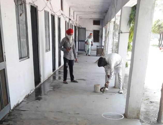 Staff marking spots to ensure social distancing at the PSPCL sub-divisional office in Doraha on Wednesday. (HT Photo) Staff marking spots to ensure social distancing at the PSPCL sub-divisional office in Doraha on Wednesday. (HT Photo)