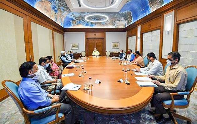 Prime Minister Narendra Modi chairs a meeting of the task force on coronavirus vaccine development in New Delhi.(@narendramodi/Twitter) Prime Minister Narendra Modi chairs a meeting of the task force on coronavirus vaccine development in New Delhi.(@narendramodi/Twitter)
