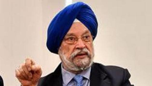 Union civil aviation minister Hardeep Puri warns travellers that the coronavirus may be around for some time in the near future. (PTI PHOTO.) Union civil aviation minister Hardeep Puri warns travellers that the coronavirus may be around for some time in the near future. (PTI PHOTO.)