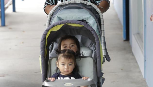 The Trump administration is being sued by citizens denied virus aid because they are married to undocumented immigrants. (AP) The Trump administration is being sued by citizens denied virus aid because they are married to undocumented immigrants. (AP)