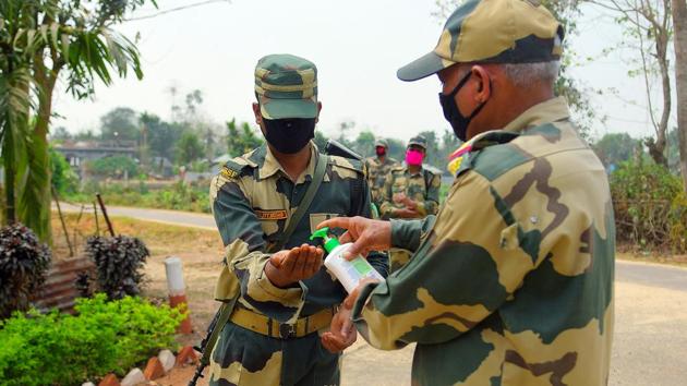 BSF personnel sanitizing their hands on the 10th day of the nationwide lockdown at India-Bangladesh Border. (ANI/Representative Photo) BSF personnel sanitizing their hands on the 10th day of the nationwide lockdown at India-Bangladesh Border. (ANI/Representative Photo)