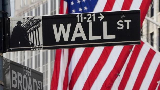 The Wall Street sign is pictured at the New York Stock exchange (NYSE) in the Manhattan borough of New York City, New York, US. (REUTERS) The Wall Street sign is pictured at the New York Stock exchange (NYSE) in the Manhattan borough of New York City, New York, US. (REUTERS)