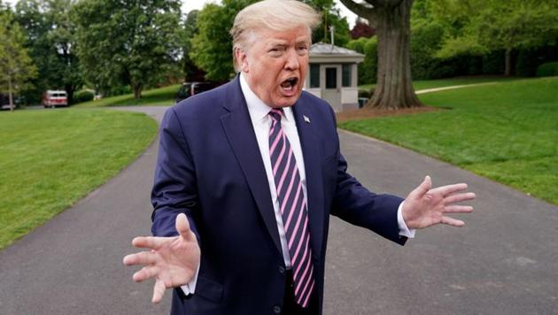 Donald Trump told reporters that projections of Johns Hopkins University are with no mitigation.(REUTERS) Donald Trump told reporters that projections of Johns Hopkins University are with no mitigation.(REUTERS)
