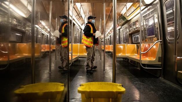 A New York City MTA transit worker cleans a subway car during the outbreak of the coronavirus disease (COVID-19) in New York City on May 6. (Jeenah Moon / REUTERS)