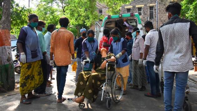 An affected woman on a wheelchair being taken for treatment at King George Hospital. People being brought to hospitals showed signs of nausea and dizziness-- symptoms caused when styrene is inhaled. (PTI) An affected woman on a wheelchair being taken for treatment at King George Hospital. People being brought to hospitals showed signs of nausea and dizziness-- symptoms caused when styrene is inhaled. (PTI)