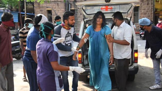Visakhapatnam: An affected woman being taken for treatment at King George Hospital after a major chemical gas leakage at LG Polymers industry in RR Venkatapuram village on May 7, 2020. (PTI) Visakhapatnam: An affected woman being taken for treatment at King George Hospital after a major chemical gas leakage at LG Polymers industry in RR Venkatapuram village on May 7, 2020. (PTI)