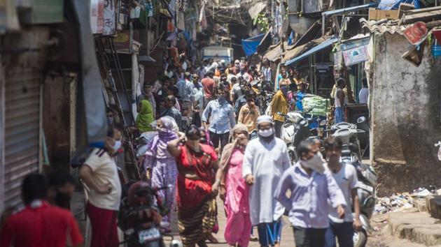A large crowd flouting social distancing is seen in Dharavi’s Naik Nagar.The state government is focussing on strengthening medical infrastructure in view of a likely spike in the number of cases. As per a projection by the central government, going by a doubling rate of 10 days, Mumbai could see around 29,000 cases by mid-May. (Satyabrata Tripathy / HT Photo) A large crowd flouting social distancing is seen in Dharavi’s Naik Nagar.The state government is focussing on strengthening medical infrastructure in view of a likely spike in the number of cases. As per a projection by the central government, going by a doubling rate of 10 days, Mumbai could see around 29,000 cases by mid-May. (Satyabrata Tripathy / HT Photo)