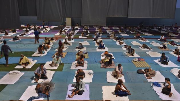Migrant workers and homeless people seen at Yamuna Sports Complex turned into shelter home during lockdown in New Delhi. (Raj K Raj/HT PHOTO) Migrant workers and homeless people seen at Yamuna Sports Complex turned into shelter home during lockdown in New Delhi. (Raj K Raj/HT PHOTO)