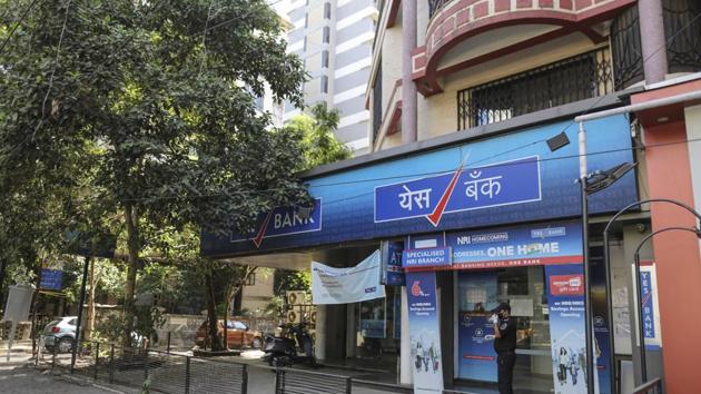 A security guard wearing a protective mask stands outside a Yes Bank Ltd. branch on a near-empty street in Mumbai, India, on Monday, May 4, 2020. India's central bank Governor Shaktikanta Das and the chief executive officers of the nation's banks have discussed ways to ensure credit flow to businesses once the world's toughest stay-at-home order ends. Photographer: Dhiraj Singh/Bloomberg (Bloomberg) A security guard wearing a protective mask stands outside a Yes Bank Ltd. branch on a near-empty street in Mumbai, India, on Monday, May 4, 2020. India's central bank Governor Shaktikanta Das and the chief executive officers of the nation's banks have discussed ways to ensure credit flow to businesses once the world's toughest stay-at-home order ends. Photographer: Dhiraj Singh/Bloomberg (Bloomberg)