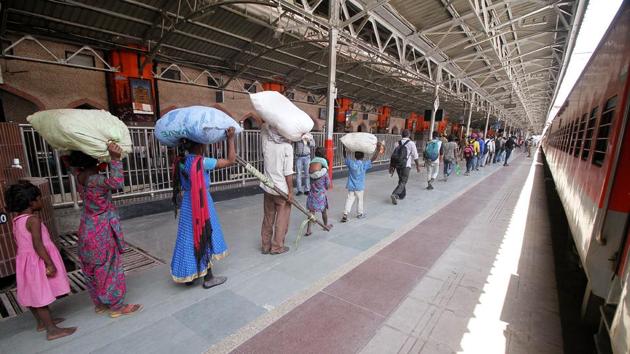 Migrant Labours who were stranded in Gujarat arrive at Charbagh Railway station by a special Train in Lucknow on Wednesday. (ANI Photo) (ANI) Migrant Labours who were stranded in Gujarat arrive at Charbagh Railway station by a special Train in Lucknow on Wednesday. (ANI Photo) (ANI)
