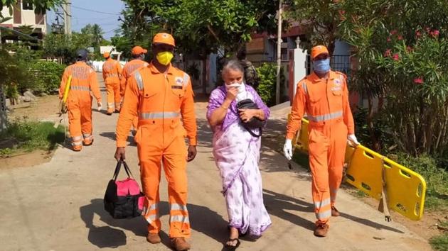NDRF personnel evacuate an elderly woman from the affected area in RR Venkatapuram village, Visakhapatnam. An NDRF team reached the site of the accident shortly after the local administration had been informed about the gas leak and neutralised the situation. (PTI) NDRF personnel evacuate an elderly woman from the affected area in RR Venkatapuram village, Visakhapatnam. An NDRF team reached the site of the accident shortly after the local administration had been informed about the gas leak and neutralised the situation. (PTI)