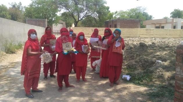 Asha workers in Hisar with the safety gears provided to them by a social organisation. (HT PHOTO) Asha workers in Hisar with the safety gears provided to them by a social organisation. (HT PHOTO)