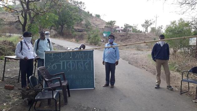 Teachers on duty at Kusgaon in Bhor taluka. According to Sudam Ombale, Bhor taluka teachers association president, 335 teachers have been appointed on check-post duty. (HT PHOTO) Teachers on duty at Kusgaon in Bhor taluka. According to Sudam Ombale, Bhor taluka teachers association president, 335 teachers have been appointed on check-post duty. (HT PHOTO)