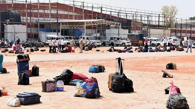 Belongings of stranded people are seen as they arrive to board onto special trains from Bengaluru to Rajasthan, run by the state government, at Palace Grounds in Bengaluru. (ANI) Belongings of stranded people are seen as they arrive to board onto special trains from Bengaluru to Rajasthan, run by the state government, at Palace Grounds in Bengaluru. (ANI)