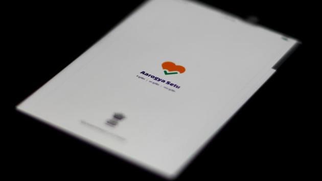 The Aarogya Setu app logo is seen on a mobile phone. Arogya Setu uses a smartphone’s GPS and Bluetooth features to track contact and location trails. (REUTERS) The Aarogya Setu app logo is seen on a mobile phone. Arogya Setu uses a smartphone’s GPS and Bluetooth features to track contact and location trails. (REUTERS)
