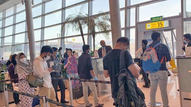 Passengers at the boarding gate of Abu Dhabi Airport ready to board Abu Dhabi to Kochi special flight IX452 under Vande Bharat Mission, in Abu Dhabi on Thursday.(ANI Photo) Passengers at the boarding gate of Abu Dhabi Airport ready to board Abu Dhabi to Kochi special flight IX452 under Vande Bharat Mission, in Abu Dhabi on Thursday.(ANI Photo)