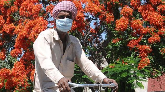 A cyclist wear face mask during Covid-19 lockdown in Patiala. (Bharat Bhushan/HT Photo) A cyclist wear face mask during Covid-19 lockdown in Patiala. (Bharat Bhushan/HT Photo)