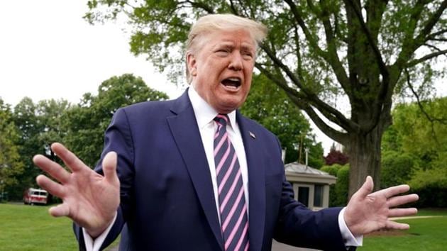 US President Donald Trump speaks to reporters as he departs on travel to Phoenix, Arizona from the South Lawn of the White House in Washington, US. (REUTERS) US President Donald Trump speaks to reporters as he departs on travel to Phoenix, Arizona from the South Lawn of the White House in Washington, US. (REUTERS)