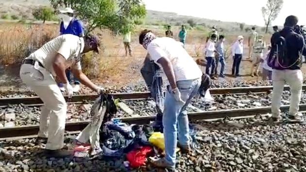 Police officials investigating at the railway track where 16 migrant workers died and several injured in a train accident in Aurangabad on Friday. (ANI) Police officials investigating at the railway track where 16 migrant workers died and several injured in a train accident in Aurangabad on Friday. (ANI)