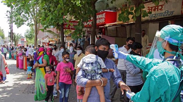 Apart from ration kits, the Pune Municipal Corporation (PMC) also plans to provide sanitisers and one lakh masks to residents of containment zones. (Ravindra Joshi/ HT file photo)