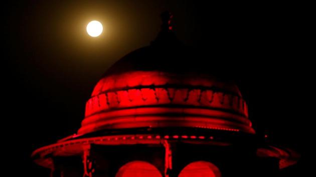 The Super Flower Moon rises over the building of the Ministry of Defence in New Delhi on May 7. This full moon corresponded to Vesak, also known as Buddha Purnima, a holiday observed by Buddhists across Asia. (Adnan Abidi / REUTERS) The Super Flower Moon rises over the building of the Ministry of Defence in New Delhi on May 7. This full moon corresponded to Vesak, also known as Buddha Purnima, a holiday observed by Buddhists across Asia. (Adnan Abidi / REUTERS)