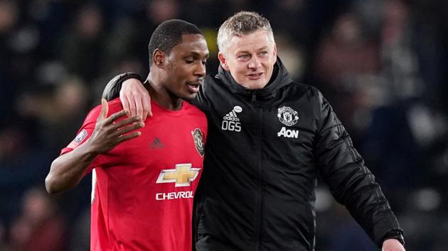 Manchester United manager Ole Gunnar Solskjaer celebrates with Odion Ighalo after the match.(REUTERS)