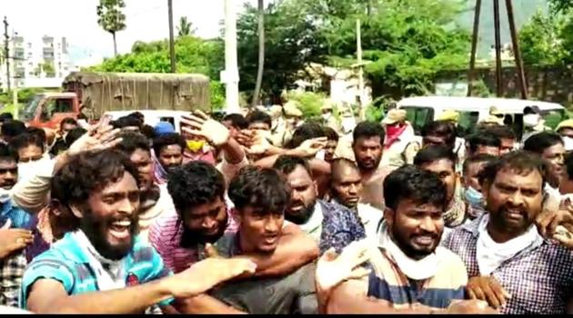 With the situation getting tense, the police had to resort to lathi-charge to disperse them. They bundled scores of protesters into vans and took them away to the Gopalapatnam police station. (HT Photo)