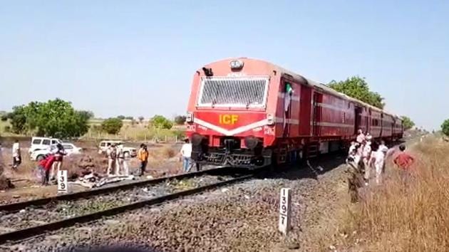 Police officials investigating at the railway track where 16 migrant workers died and several injured in a train accident in Aurangabad on Friday. (ANI Photo) Police officials investigating at the railway track where 16 migrant workers died and several injured in a train accident in Aurangabad on Friday. (ANI Photo)