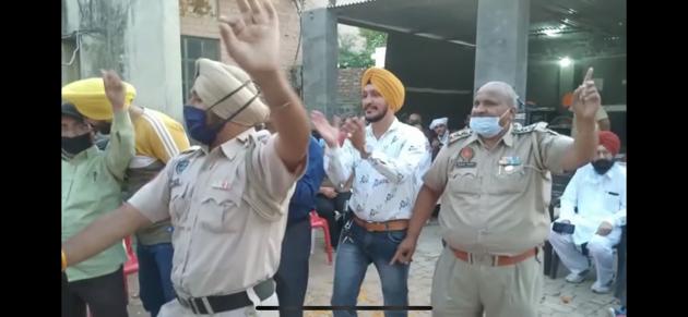 A station house officer organised an event on the premises of the Kot Khalsa police station in Amritsar, defying the social-distancing norms imposed in the wake of the Covid-19 outbreak prohibiting gathering of more than 10 persons at religious or ceremonial functions. (HT PHOTO) A station house officer organised an event on the premises of the Kot Khalsa police station in Amritsar, defying the social-distancing norms imposed in the wake of the Covid-19 outbreak prohibiting gathering of more than 10 persons at religious or ceremonial functions. (HT PHOTO)