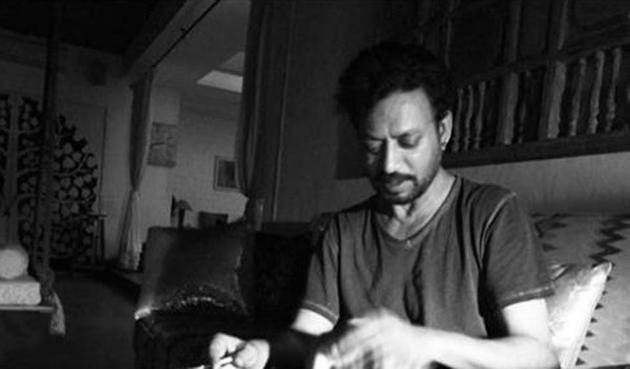 Late Irrfan Khan is seen playing with his cat in this throwback image. Late Irrfan Khan is seen playing with his cat in this throwback image.
