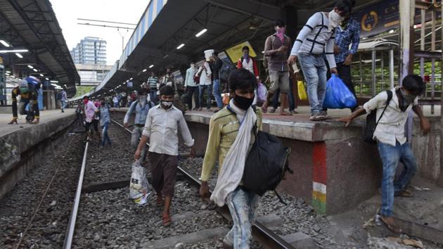 Migrant workers in Mumbai were seen walking the tracks in Kanjurmarg, a suburb in the city, on May 7. Often rail tracks are the shortest route home. Migrants have also been walking on and along them to avoid police brutality on the roads, according to a report in Mint. (Satish Bate / HT Photo) Migrant workers in Mumbai were seen walking the tracks in Kanjurmarg, a suburb in the city, on May 7. Often rail tracks are the shortest route home. Migrants have also been walking on and along them to avoid police brutality on the roads, according to a report in Mint. (Satish Bate / HT Photo)