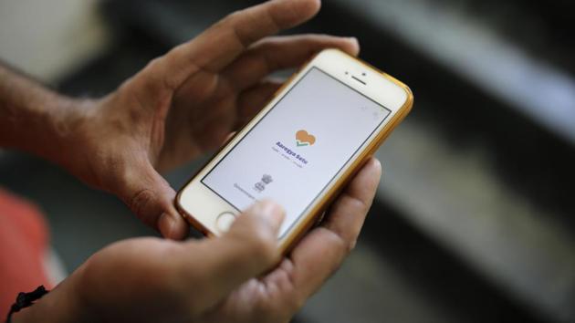 By design, the Aarogya Setu app goes a step further than most such tools developed around the world. It tracks where people have been, instead of merely determining who they were in close contact with (AP) By design, the Aarogya Setu app goes a step further than most such tools developed around the world. It tracks where people have been, instead of merely determining who they were in close contact with (AP)