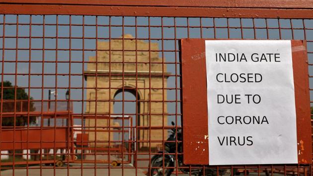 A sign pasted on a security barricade is seen after the India Gate war memorial was closed for visitors amid measures for coronavirus prevention in New Delhi, India, March 19, 2020.(REUTERS)