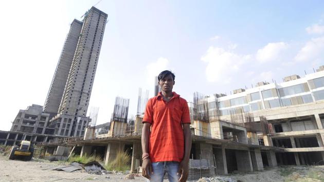 Prakash Kumar, 35, resumed work as a construction worker in Noida on May 4. A native of Jharkhand, he has been queuing at food distribution centres after his earnings depleted when the lockdown was put in place. (Sunil Ghosh / HT Photo) Prakash Kumar, 35, resumed work as a construction worker in Noida on May 4. A native of Jharkhand, he has been queuing at food distribution centres after his earnings depleted when the lockdown was put in place. (Sunil Ghosh / HT Photo)