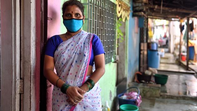 Shutika Dhwade, 40, works as a domestic help, in Vile Parle, Mumbai, India. Following the order by the MHA on May 2 that eased certain restrictions on standalone workers, she resumed work on May 4.  (Satish Bate / HT Photo) 