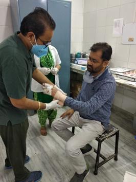 Malerkotla SDM Vikramjeet Singh Panthey being treated after the attack.(HT PHOTO)