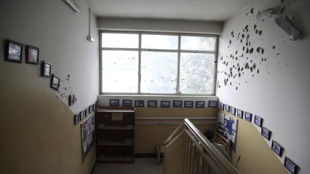 A bullet holes line the wall of a maternity hospital, in Kabul, Afghanistan, Tuesday, May 12, 2020. (AP photo) A bullet holes line the wall of a maternity hospital, in Kabul, Afghanistan, Tuesday, May 12, 2020. (AP photo)
