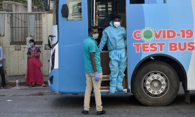 Mumbai, India - May 7, 2020: A medical screening organized for the Mumbai police and Worli koliwada residents at Worli, during the nationwide lockdown, imposed in the wake of the coronavirus pandemic. (Satish Bate/HT Photo) Mumbai, India - May 7, 2020: A medical screening organized for the Mumbai police and Worli koliwada residents at Worli, during the nationwide lockdown, imposed in the wake of the coronavirus pandemic. (Satish Bate/HT Photo)