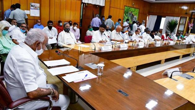Karnataka Chief Minister BS Yediyurappa holds meeting with Opposition parties over coronavirus situation at Chief Minister's Office in Bengaluru on Friday. (ANI Photo) Karnataka Chief Minister BS Yediyurappa holds meeting with Opposition parties over coronavirus situation at Chief Minister's Office in Bengaluru on Friday. (ANI Photo)