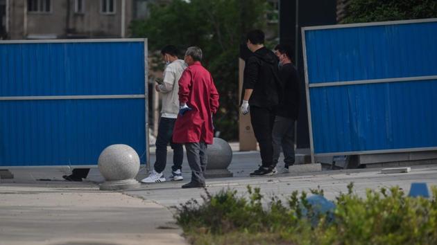 China has largely brought the virus under control, but it has been on edge about being hit by a second wave as it lifted lockdowns and restrictions across the country. Virus clusters have appeared in recent weeks in the northeastern provinces of Jilin and Heilongjiang, which border Russia. (Hector RETAMAL / AFP)