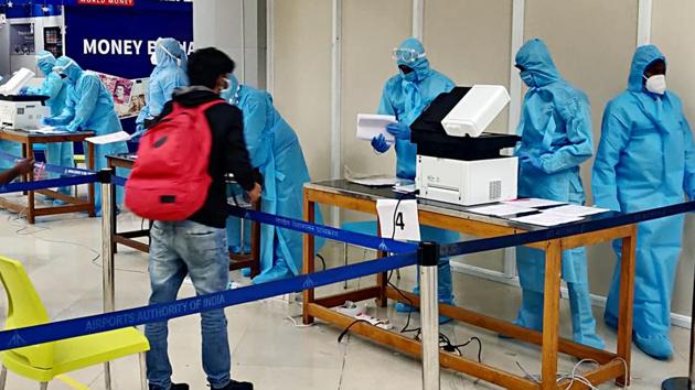 Indians stranded in Malaysia undergo their COVID-19 testing as they arrive Chennai Airport by a special flight under mission Vande Bharat in Chennai on Monday. (ANI photo) Indians stranded in Malaysia undergo their COVID-19 testing as they arrive Chennai Airport by a special flight under mission Vande Bharat in Chennai on Monday. (ANI photo)
