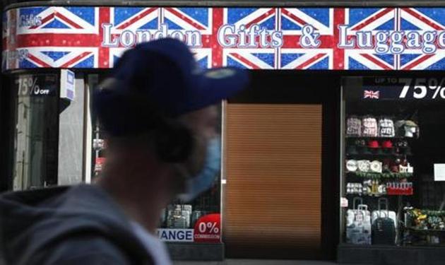 A closed tourist souvenir shop on Oxford Street in London, as the country is in lockdown to help curb the spread of the coronavirus, Wednesday, April 15, 2020. (AP) A closed tourist souvenir shop on Oxford Street in London, as the country is in lockdown to help curb the spread of the coronavirus, Wednesday, April 15, 2020. (AP)