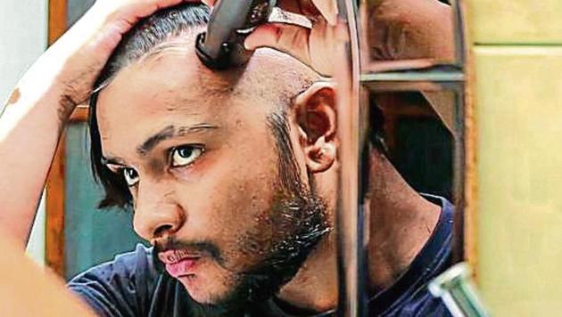 Zahid Akhtar has literally found his groove, and now posts tutorials on YouTube for others cutting their own hair for the first time.