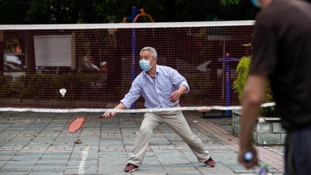 Officials have been ordered to submit plans to administer nucleic acid tests on all residents in the city of 11 million people, according to an official notice carried by news outlets. The plan came after Wuhan reported the first cluster of new COVID-19 infections since the city reopened after 76 days of lockdown on April 8. (STR / AFP /China OUT)
