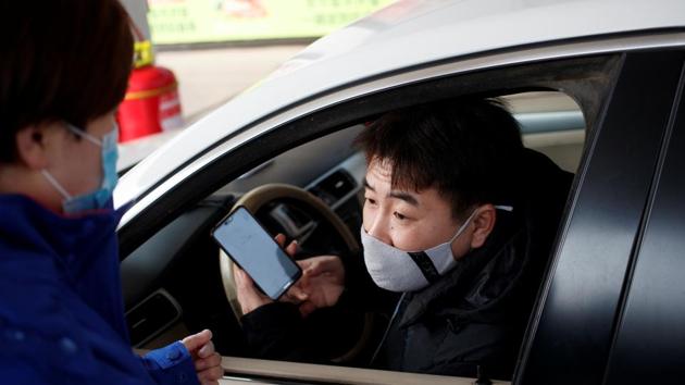 A customer uses an app to order groceries at a Sinopec gas station where customers can buy supplies while they refuel as the country is hit by an outbreak of the novel coronavirus, in Beijing, China. (REUTERS/Representative Image) A customer uses an app to order groceries at a Sinopec gas station where customers can buy supplies while they refuel as the country is hit by an outbreak of the novel coronavirus, in Beijing, China. (REUTERS/Representative Image)
