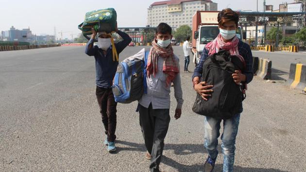 Migrant workers walking back to their homes on foot despite facilities for Shramik Special trains along the Delhi-Gurugram expressway in Gurugram on Monday. (Yogendra Kumar/HT Photo) Migrant workers walking back to their homes on foot despite facilities for Shramik Special trains along the Delhi-Gurugram expressway in Gurugram on Monday. (Yogendra Kumar/HT Photo)